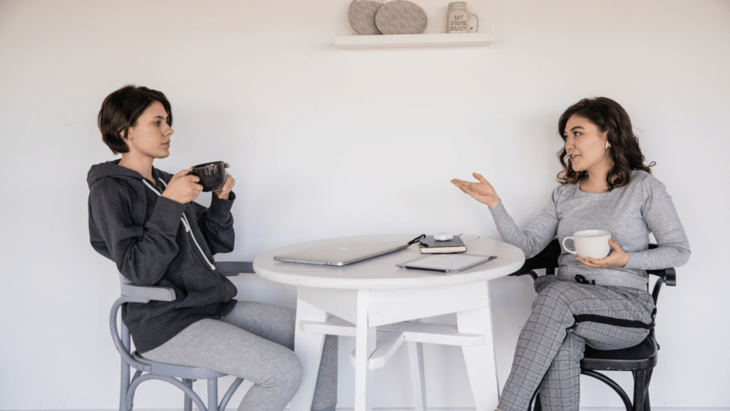 Two women having having conversation